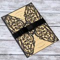 Black laser-cut Halloween party invitation cards featuring hollow designs, perfect for kids' Halloween celebration invites.