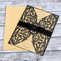 Laser cut Halloween invitation cards in black with hollow design, perfect for kids' party invites from Everything Baby.