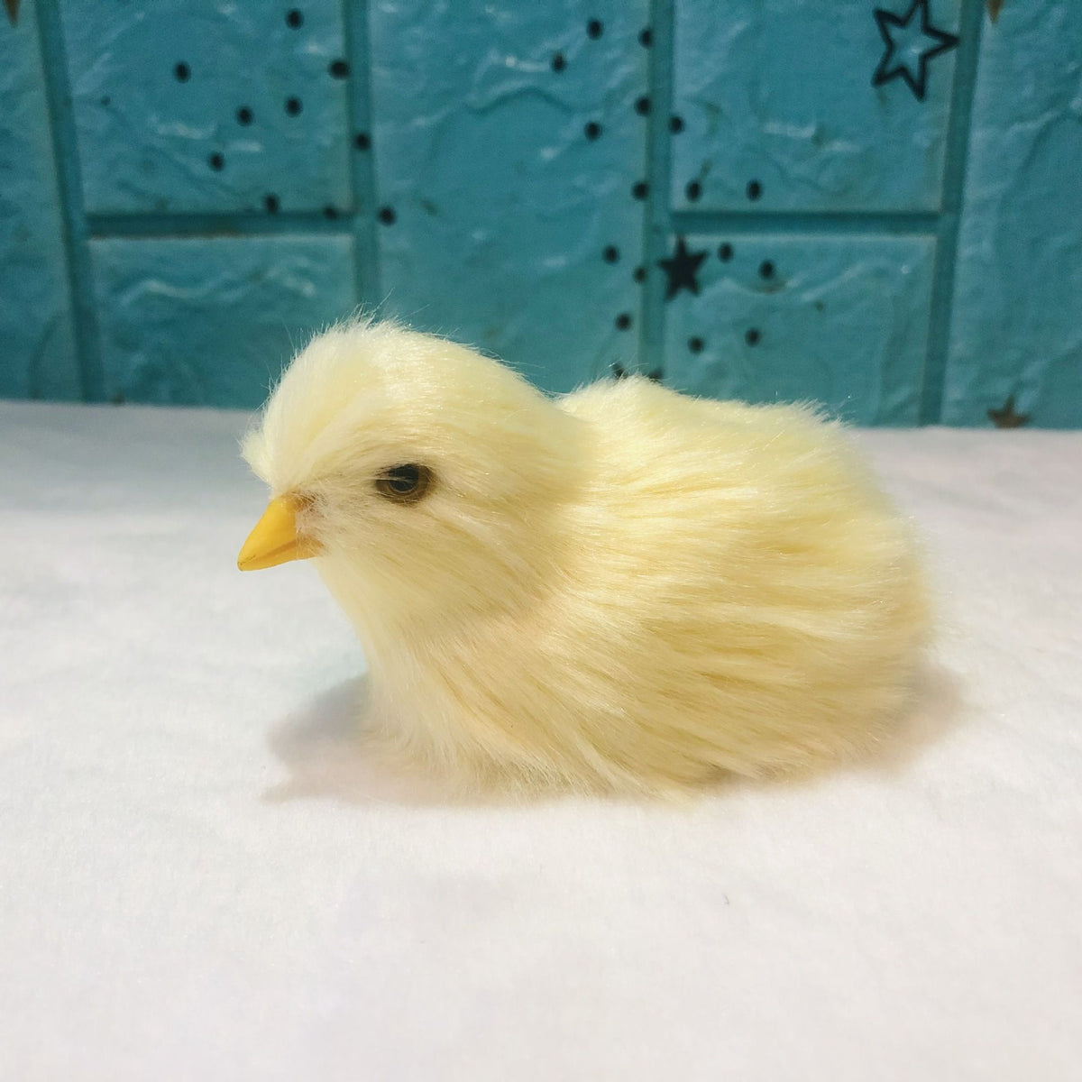 Four realistic plush chick figurines with furry texture, designed for pretend play and Easter photography props.