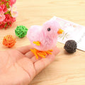 Pack of four colorful wind-up chick toys for kids, soft plastic Easter decorations and pretend play chicken toys for little boys and girls.