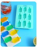 Silicone Halloween baking mold with wizard hat and skull shapes for cookies, chocolates, and candies in vibrant colors.