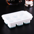 Large silicone ice cube tray with lid, stackable square design, easy release, BPA free, ideal for baby feeding and beverage chilling.