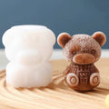 Two 3D teddy bear silicone ice cube molds for making ice cubes, soap, or candles, ideal for drinks and craft projects.