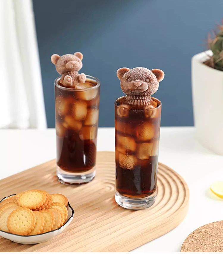Two silicone ice cube trays with 3D teddy bear molds for making ice, soap, candles, or candies, suitable for baby and kids use.