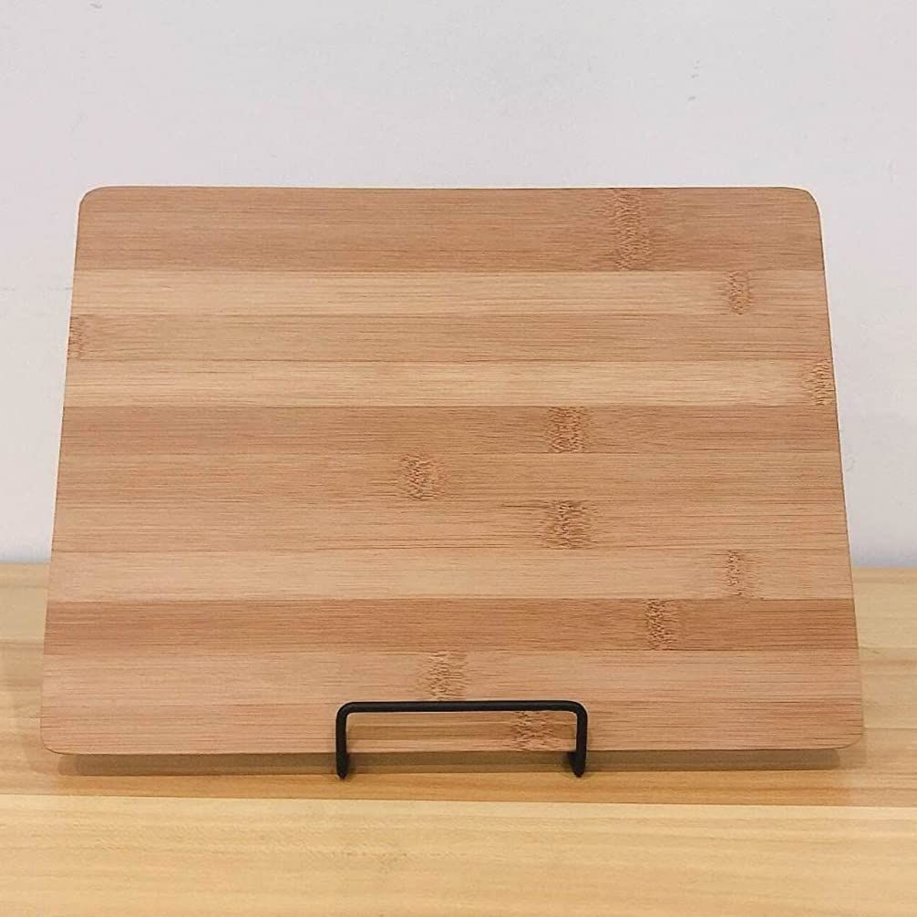 Metal square wire stand for cutting boards, cheese platters, or cookbooks, ideal for organizing kitchen or serving displays.