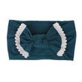 Soft wide baby headbands with hair bows in two colors for girls, infants, and toddlers, from Everything Baby.