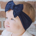 Soft wide baby headbands with bows in two colors, designed for baby girls, infants, and toddlers, by Everything Baby.