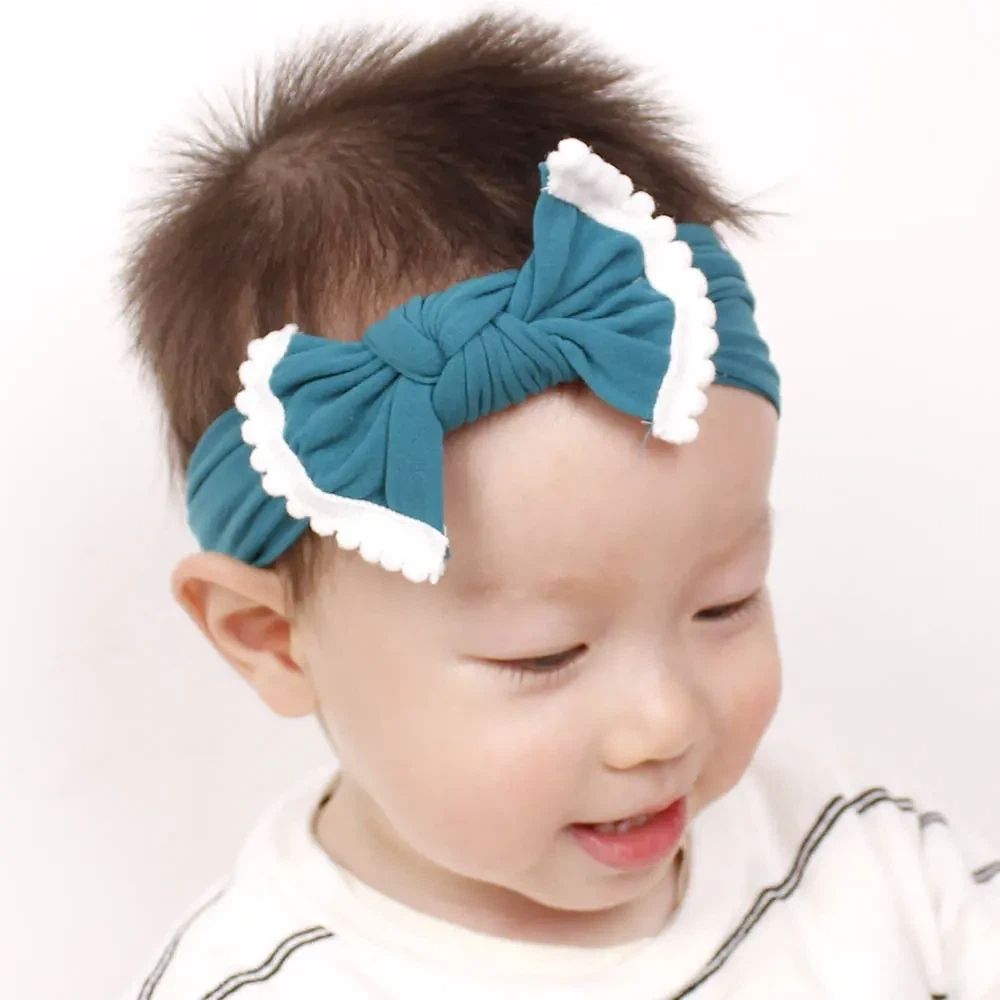 Soft wide baby headbands with bow in two colors, suitable for girls, infants, and toddlers, from Everything Baby.
