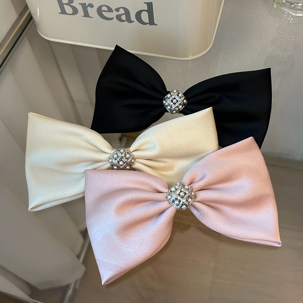 Three decorative French hair barrettes with pearl and rhinestone accents, ideal for girls and women’s spring hair accessories.