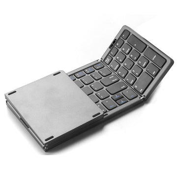Wireless foldable Bluetooth keyboard with number pad, compact and portable, designed for travel and easy to recharge.