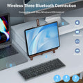 Wireless foldable Bluetooth keyboard with numeric keypad, compact portable design, ideal for travel and everyday use.