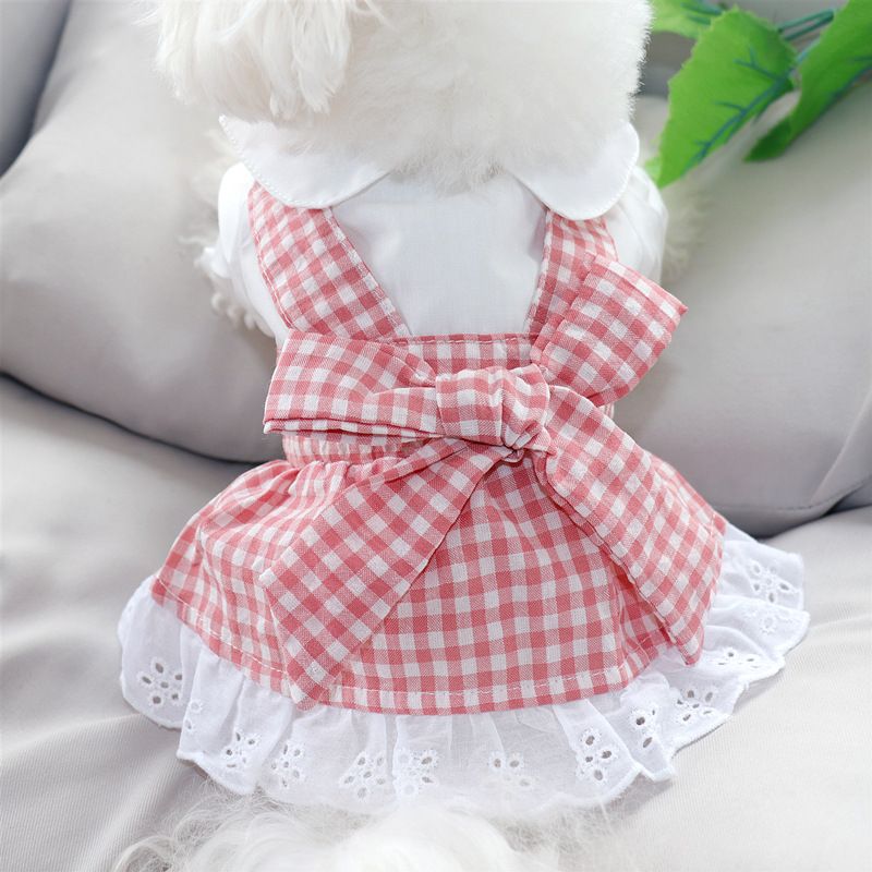 Cute plaid puppy and kitten princess dress with lace trim, bowknot, and skirt, perfect for small dogs and cats.