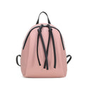 Pink vegan leather mini backpack for women, convertible shoulder bag, casual teen travel purse, stylish and lightweight.