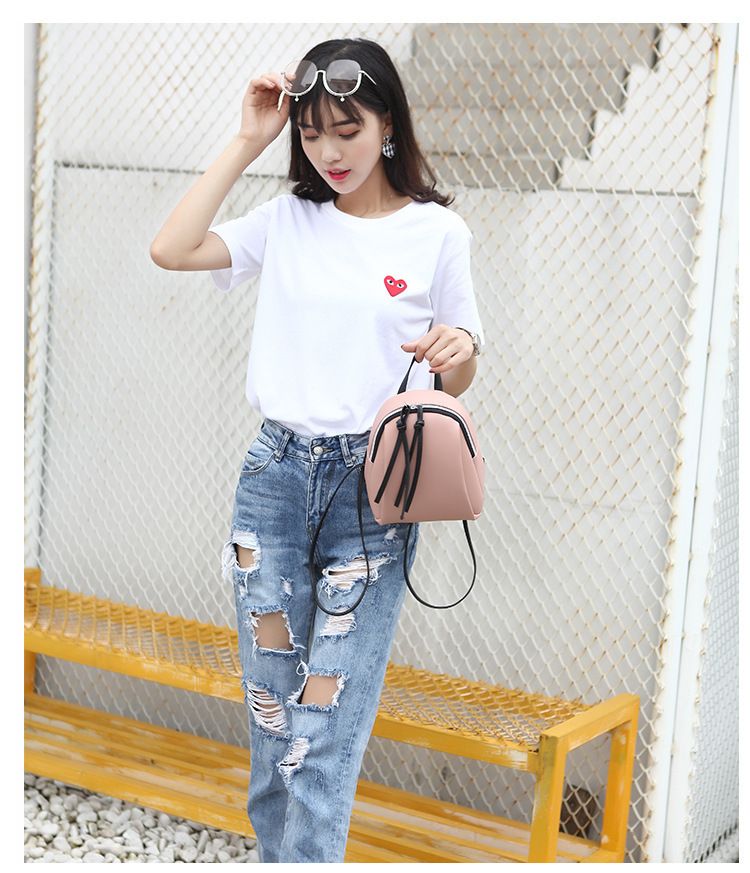 Pink vegan leather mini backpack for women, cute convertible shoulder bag, ideal for casual, travel, and outdoor use.