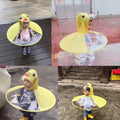 Yellow toddler raincoat with duck design and matching umbrella hat, waterproof UFO style for baby girls and boys, by Everything Baby.