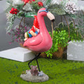 Outdoor resin garden gnome riding flamingo statue, whimsical lawn decor for garden or patio, playful outdoor sculpture by Everything Baby.