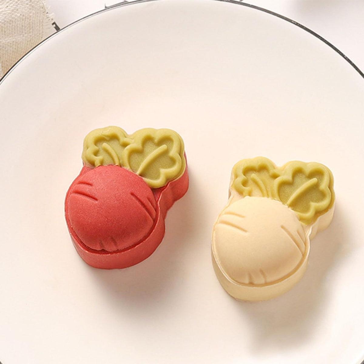 Cute carrot-shaped mooncake press mold by Everything Baby, ideal for making decorative Chinese Mid-Autumn moon cakes.