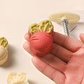 Cute carrot-shaped mooncake press mold from Everything Baby, used for making festive Chinese mooncakes and cookies.