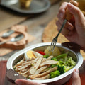 Stainless steel camping bowl with handles, ideal for serving ramen, pasta, or snacks, designed for kids' pretend play.