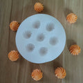 Set of three non-stick silicone molds for ice, chocolate, and candies, ideal for baking and children’s treats.