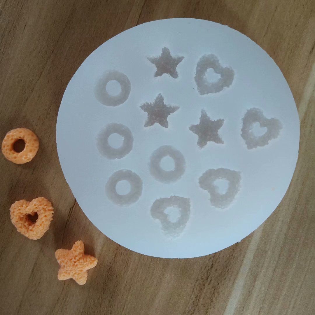 Three reusable silicone molds for chocolates, candies, and jellies, non-stick food-grade material, ideal for baby and kids treats.