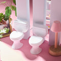 Miniature baby toilet seat toy set by Everything Baby, perfect for dollhouse pretend play and miniature bathroom scenes.