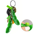 Green squeeze-a-bean soy stress relief toy set with playful charms, keychain attachment for phones and keys, by Everything Baby.