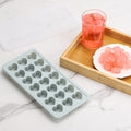 Silicone heart-shaped ice cube tray with lid, 21 cavities for ice cubes or gelatine, easy release design, ideal for baby feeding.