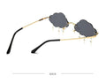 Cute rimless cloud-shaped sunglasses for girls by Everything Baby, featuring trendy vintage 90s disco-inspired design.