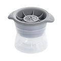 Blue and grey reusable silicone ice cube molds tray with giant spherical ice balls for whiskey, suitable for baby and kids feeding.