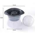 Reusable silicone ice cube molds tray with blue and grey spherical shapes, designed for making large whiskey ice balls.