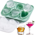 Silicone ice cube tray with 3 rose and 3 heart-shaped molds, clear lid, in green, designed for creative freezing.