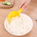 Yellow rice paddle scoop mold for rice ball making, non-stick sushi rice ball scooper, kitchen spatula, ideal for kid's pretend play.