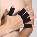 Set of 10 black summer finger sleeves for kids, elastic sports braces for arthritis and trigger finger protection, by Everything Baby.