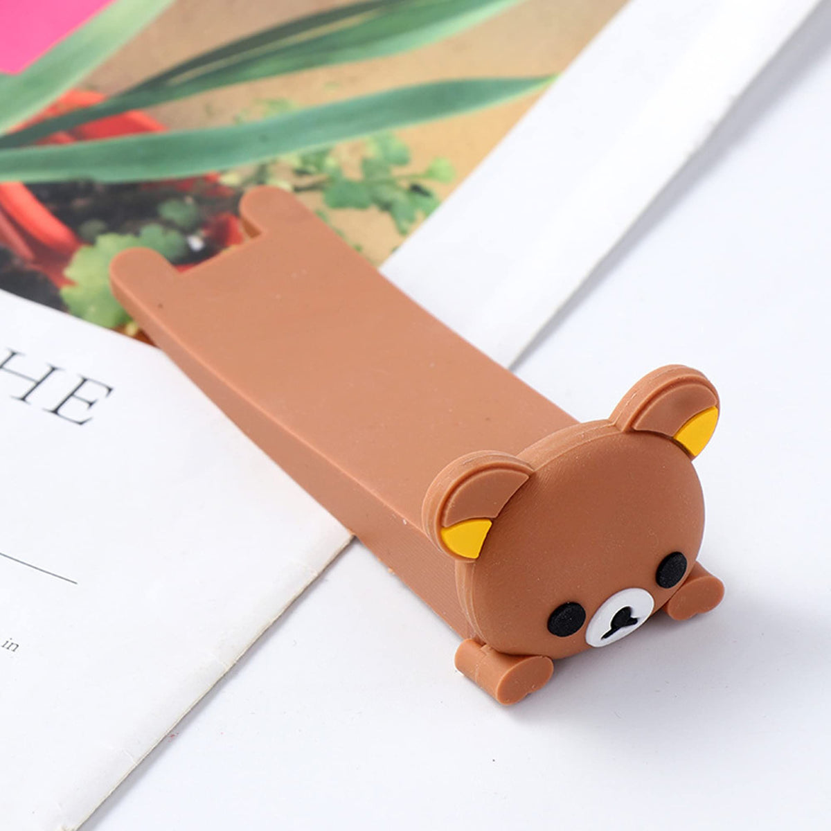 Cute cartoon animal doorstop by Everything Baby, ideal for kids' rooms, featuring a playful design to hold doors open securely.