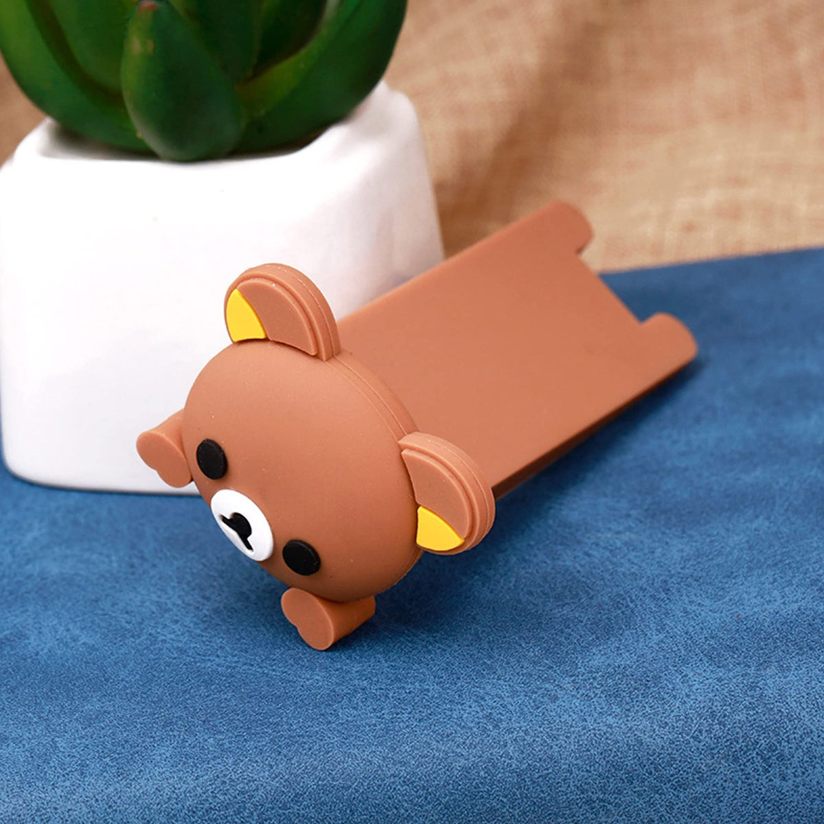 Cute animal cartoon doorstop from Everything Baby, soft wedge for door stability, ideal for kids' rooms and pretend play.