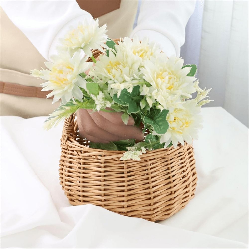 Wicker picnic basket with handle by Everything Baby, perfect for outdoor picnics, garden decor, or as a charming flower girl basket.