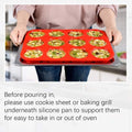 Red 12-cup silicone muffin pan from Everything Baby, perfect for baking cupcakes or kid-friendly treats.