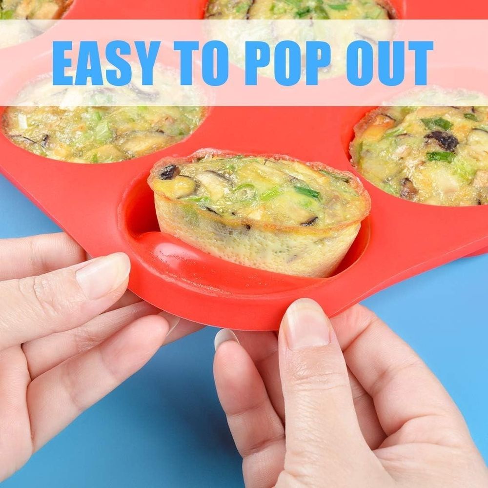 Red 12-cup silicone muffin pan by Everything Baby, ideal for baking cupcakes or muffins in baby and kids feeding activities.