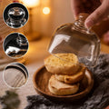 Mini dessert plate tray with glass lid and wood base for cakes, macarons, and cupcakes, ideal for parties and home serving.