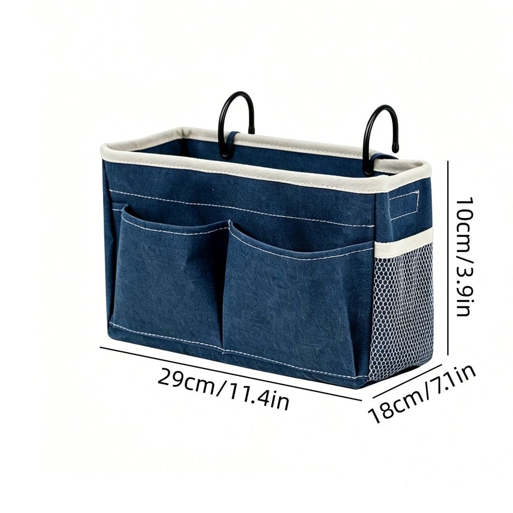 Canvas bedside caddy hanging organizer with water bottle holder for dorm bed, suitable for kids' storage and bedroom use.