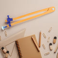 Plastic geometry compass toy from Everything Baby, designed for outdoor play, suitable for kids' educational and creative activities.
