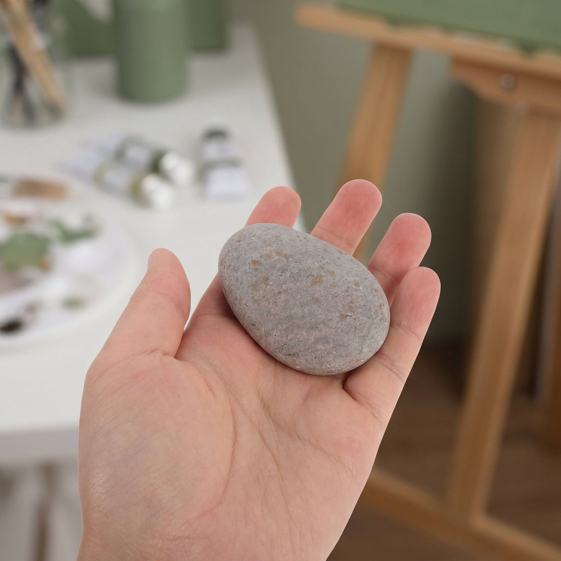 Set of 5 colorful smooth painting stones for kids' art and craft projects, flat river rocks suitable for DIY creative activities.