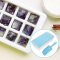 Blue ice grid toy from Everything Baby, designed for kids' building play to prevent ice cubes from connecting during family activities.