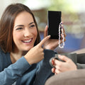Two beaded crystal phone chains by Everything Baby for preventing loss and decorating phones, suitable for everyday use.