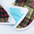 Reusable waterproof adult bib with crumb catcher, designed for women and men to protect clothing during meals.