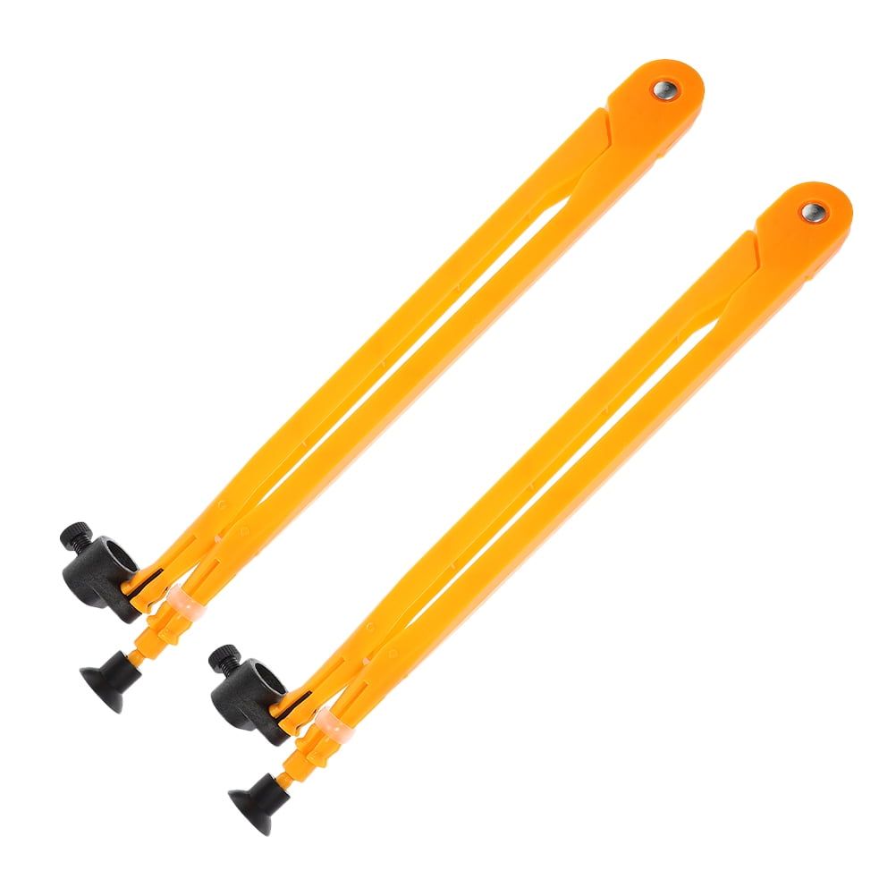 Two large plastic teaching compasses for classroom circle drawing and outdoor play, ideal for educational demonstrations.