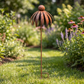 Rustic metal coneflower garden stakes set of 3, weather-resistant bronze yard art with rusted iron daisy designs for outdoor patio decor.