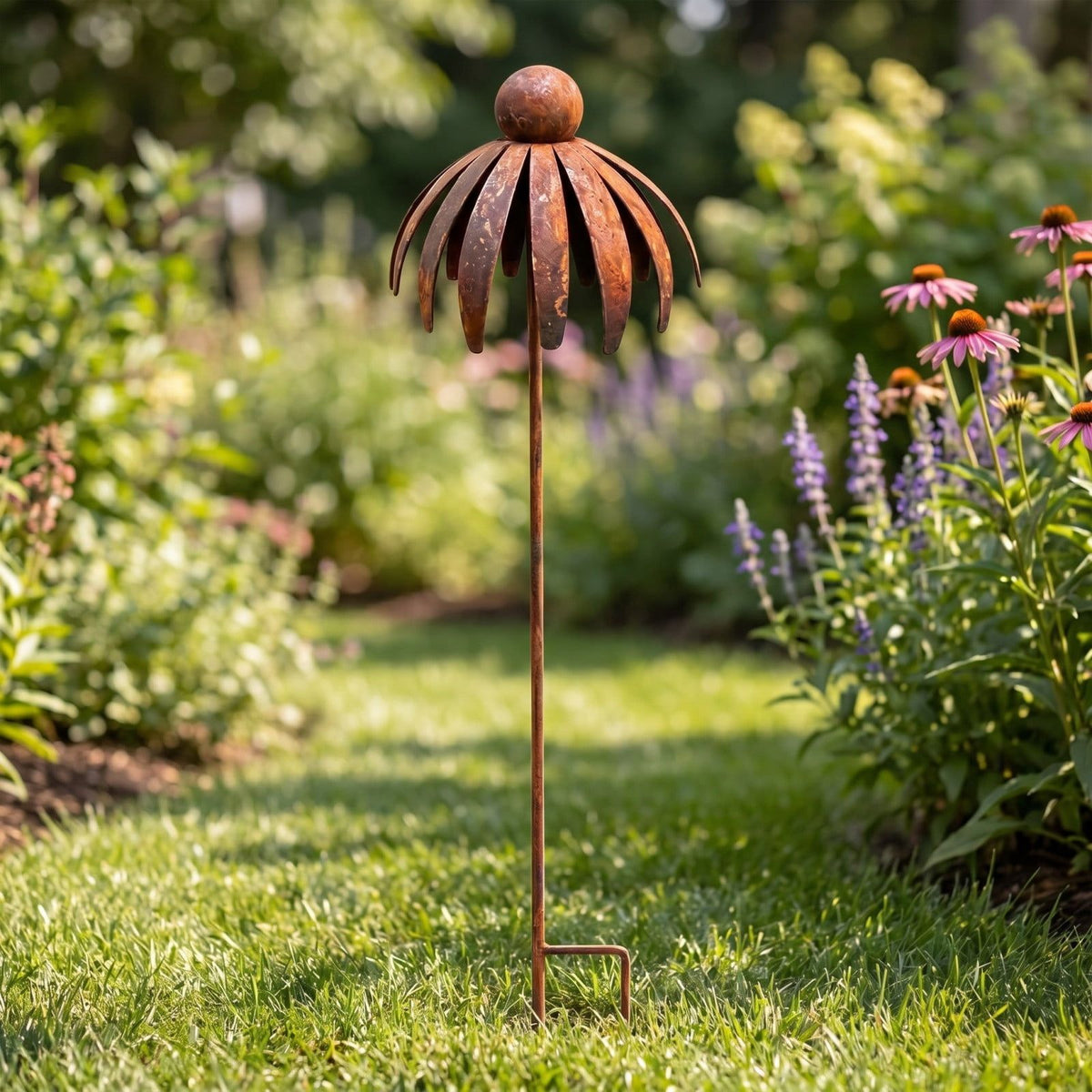 Rustic metal coneflower garden stakes set of 3, weather-resistant bronze yard art with rusted iron daisy designs for outdoor patio decor.