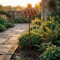 Rustic metal coneflower garden stakes set of 3, weather-resistant bronze yard art for lawn and patio decor.